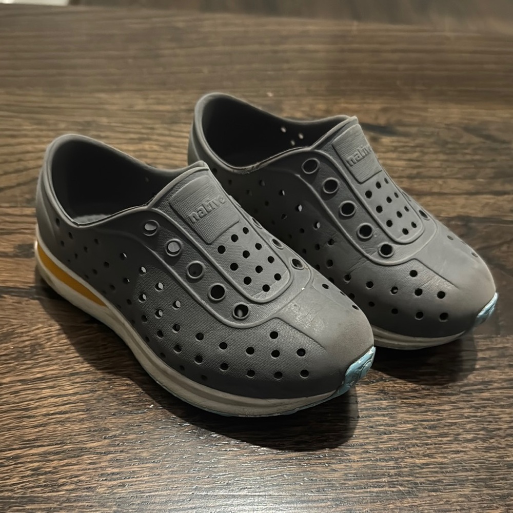 Native Gray Slip-Ons with Yellow Accent